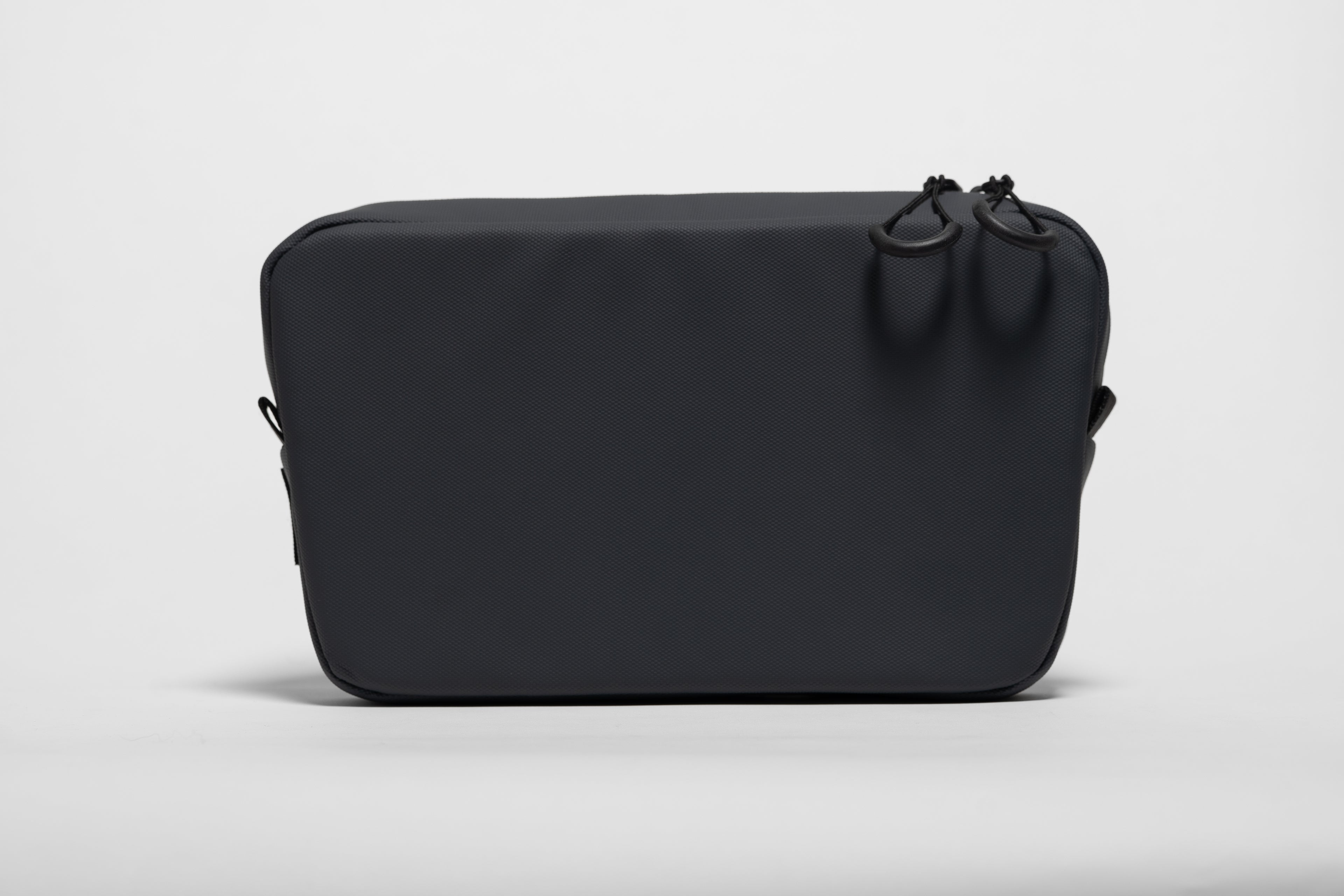 Back panel view of EDC 2L TPU Onyx Black Sling with durable TPU-coated fabric