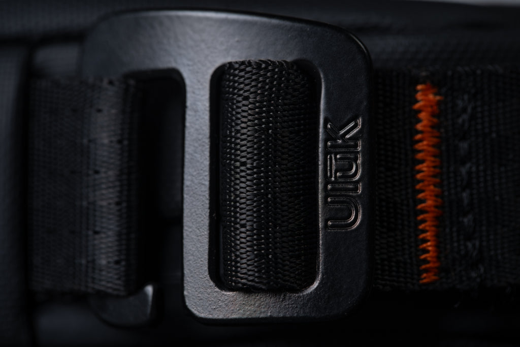 Close-up of premium Fidlock magnetic buckle on EDC 2L TPU Onyx Black Sling