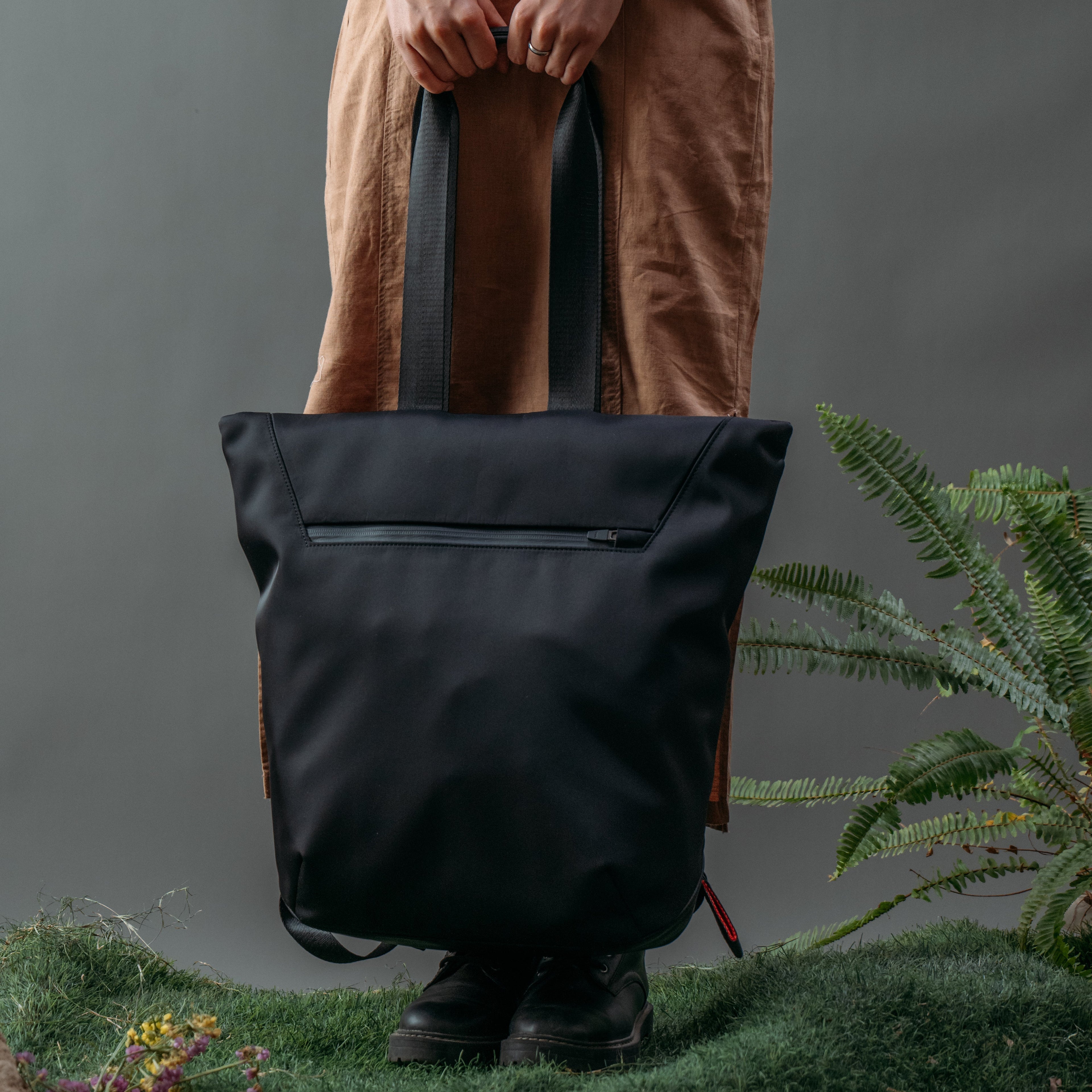ULŪK EDC.15 Totepack black front view featuring a minimalist tote design with versatile everyday carry functionality