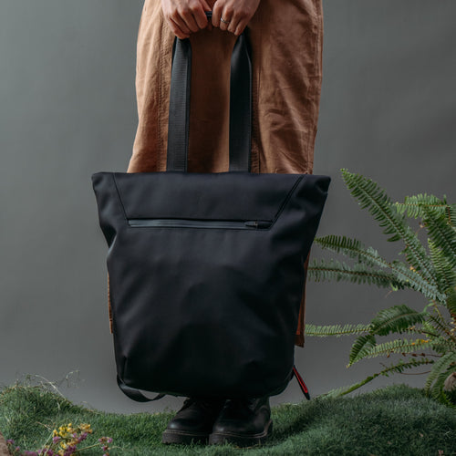 ULŪK EDC.15 Totepack black front view featuring a minimalist tote design with versatile everyday carry functionality